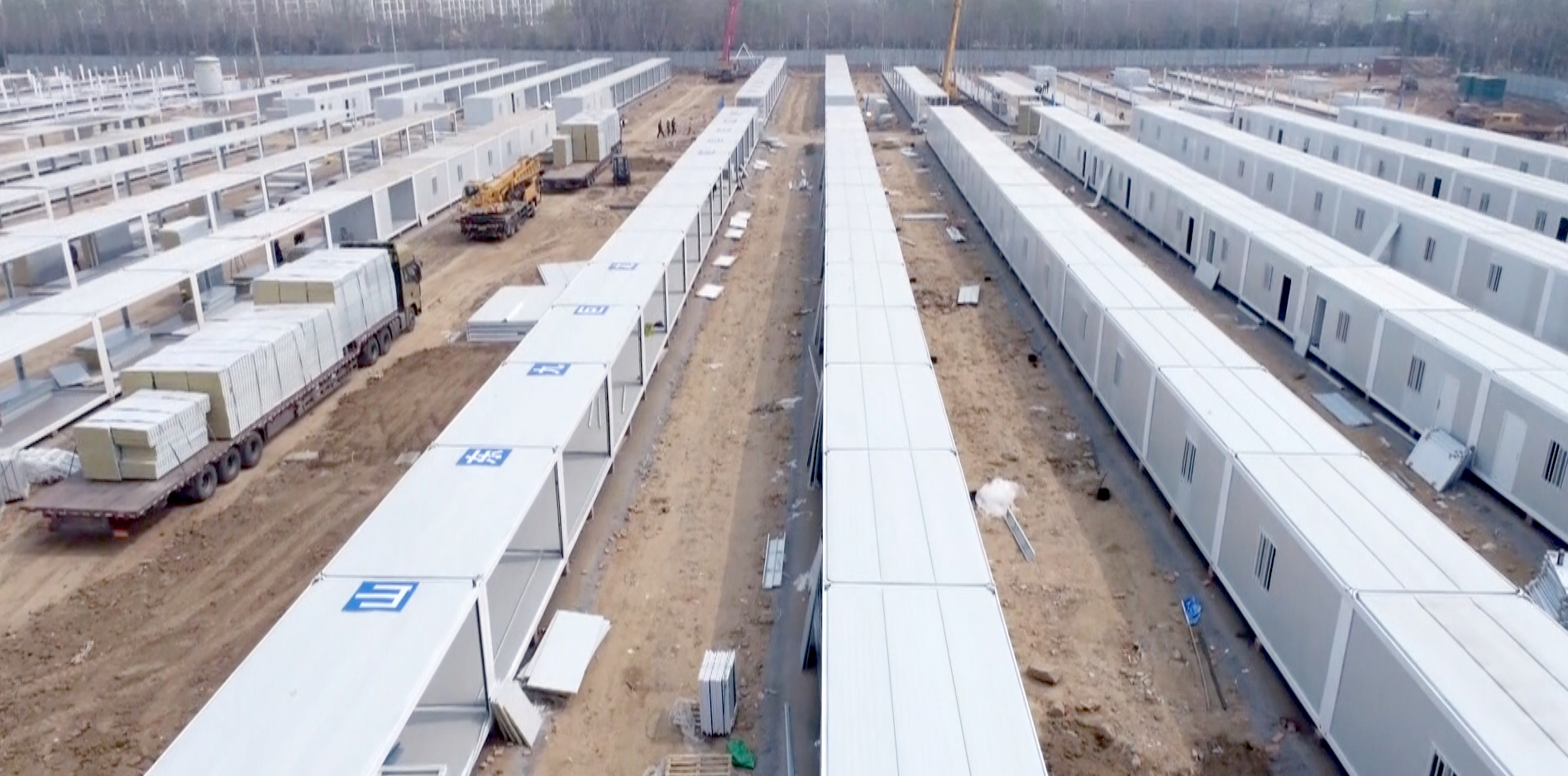 同心“抗疫”ylg060net永利娱高紧急驰援建设梁山方舱隔离点建设